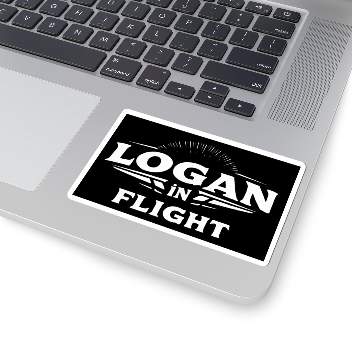 Logan in Flight Sticker