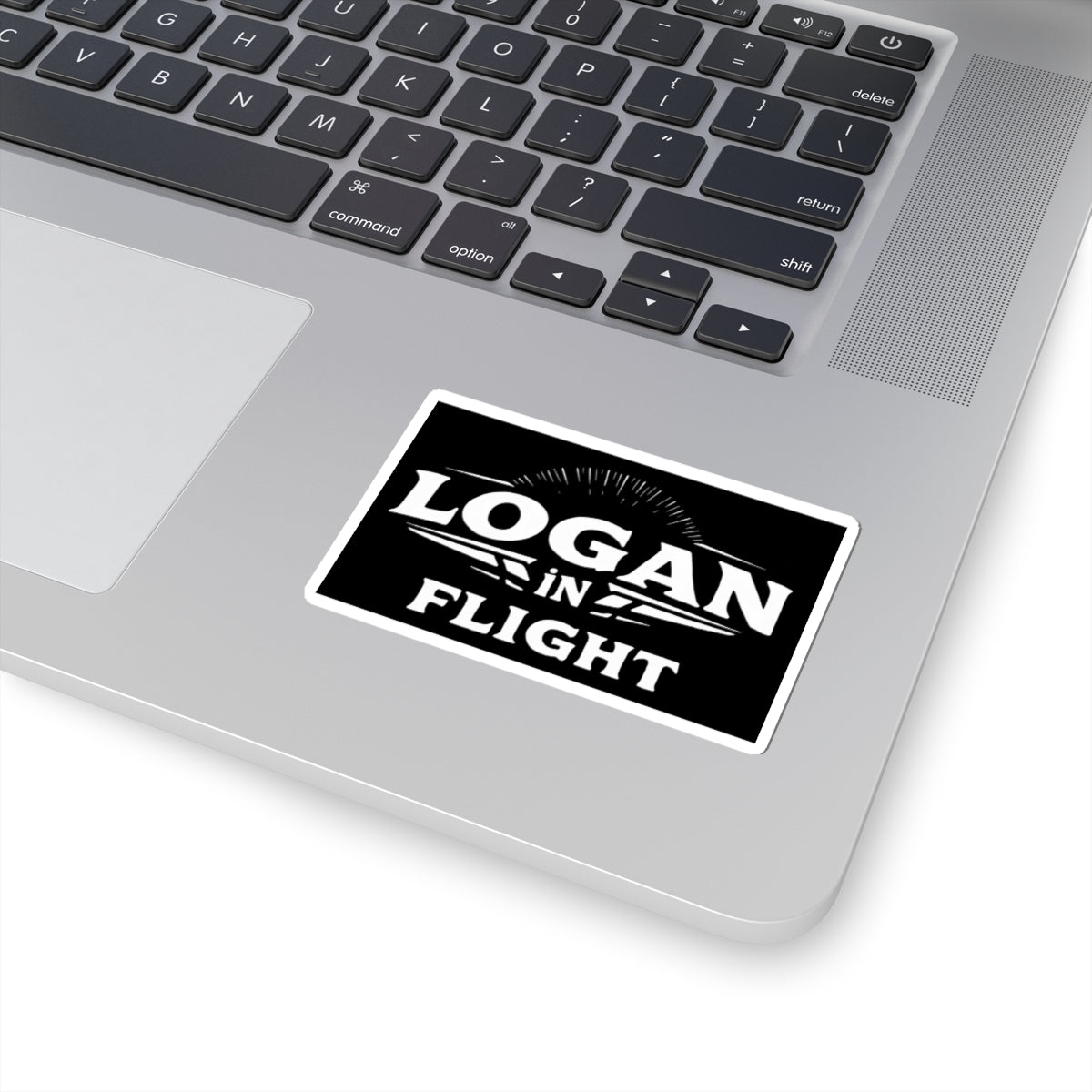 Logan in Flight Sticker