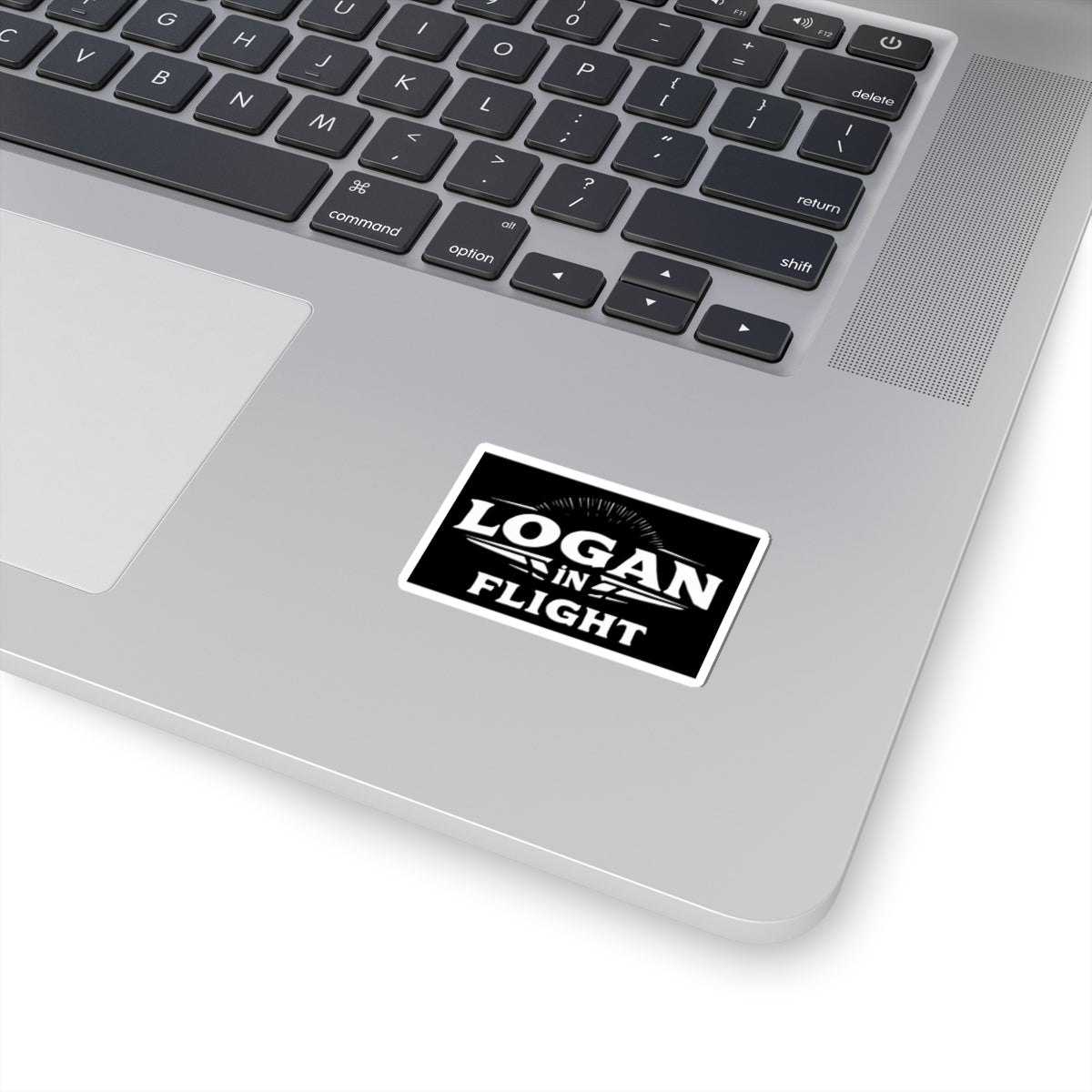 Logan in Flight Sticker